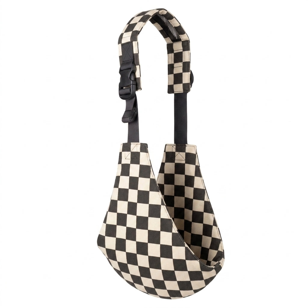 Checkered baby carrier sling with adjustable strap, black and white, isolated on white