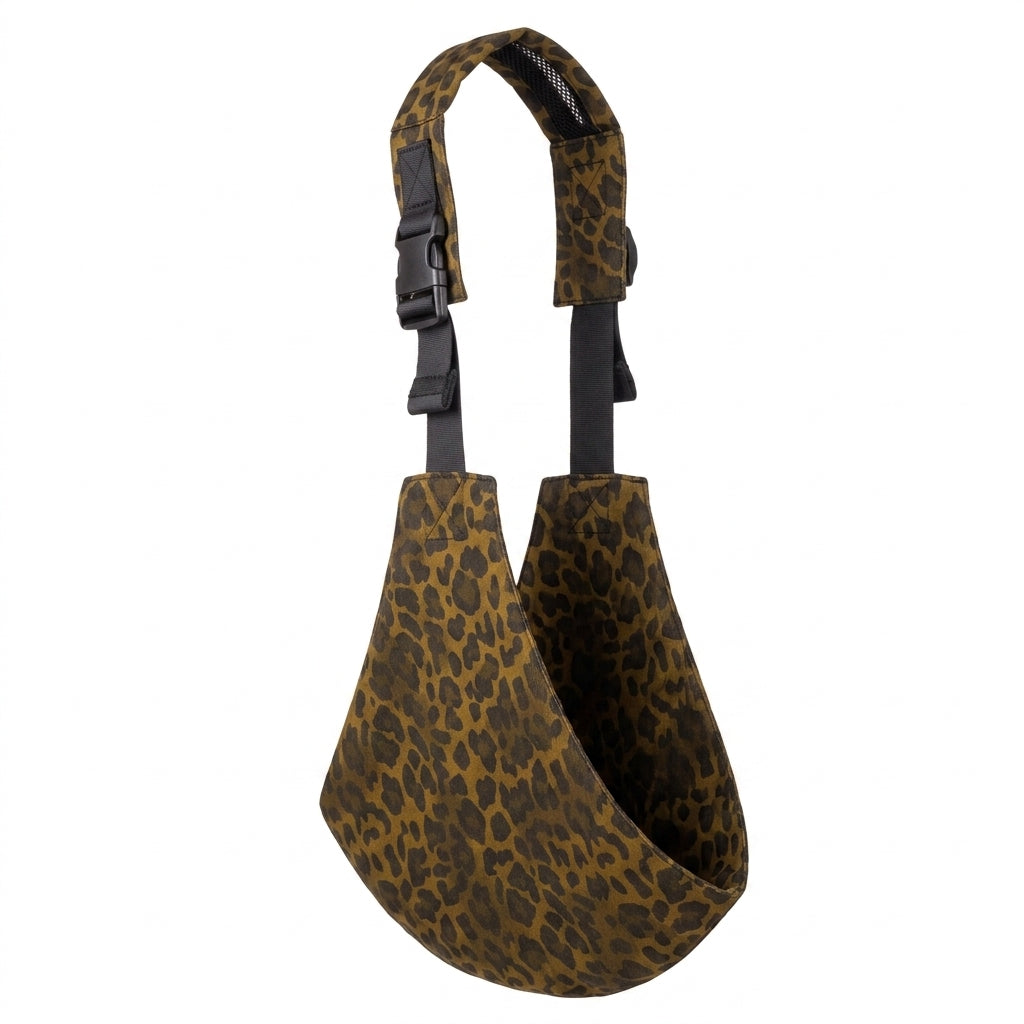 Leopard print baby carrier sling with adjustable black straps on white background